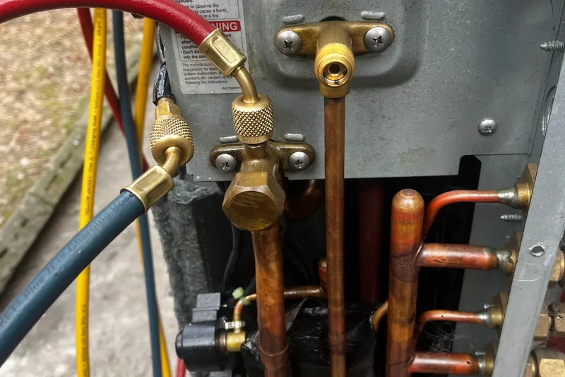 EPA Section 608 certified recovery of R600a isobutane refrigerant and copper tubing brazing